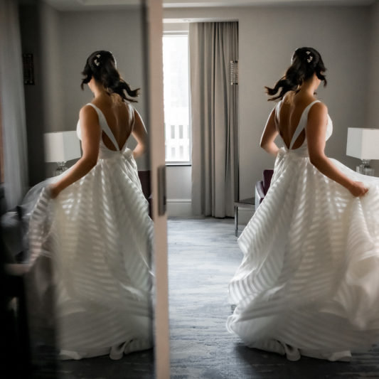 middle part pony tail bridal hair