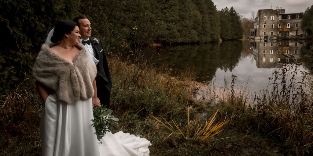 fall wedding photos back of lake at the millcroft inn