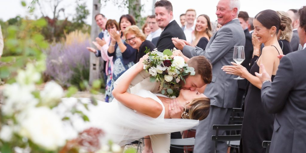 ceremony exit dip at Adamo Estate Winery