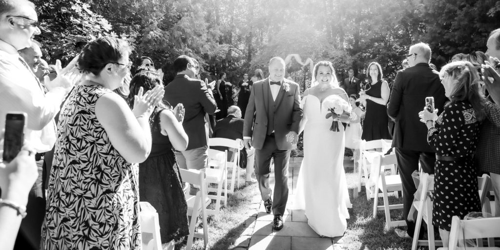 black and white ceremony photos at the millcroft inn