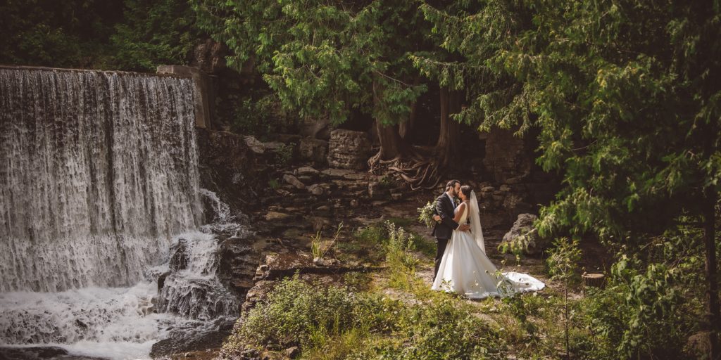 bride groom photos at the waterfall