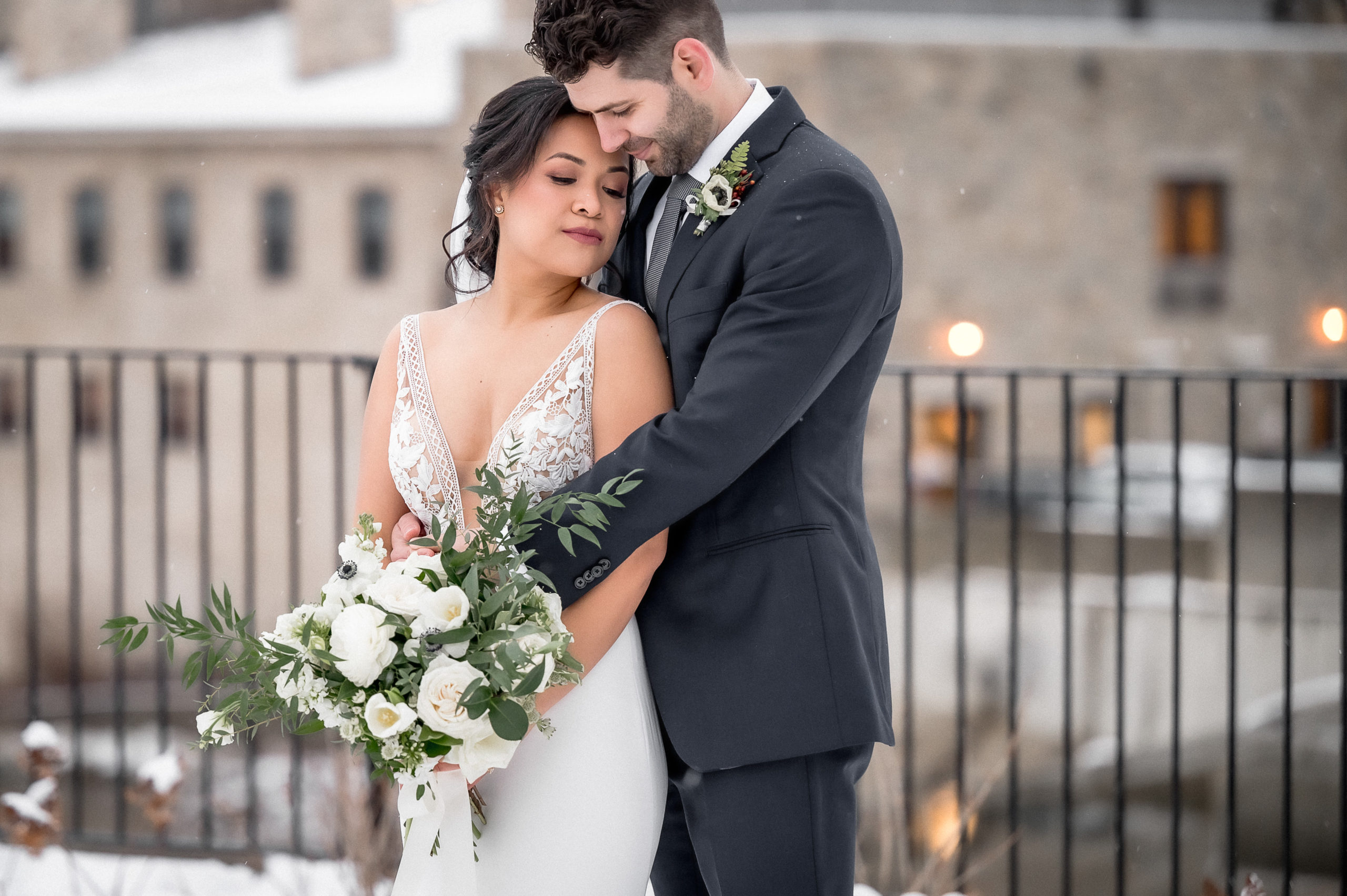 bride groom portrait with Elora Mill in background