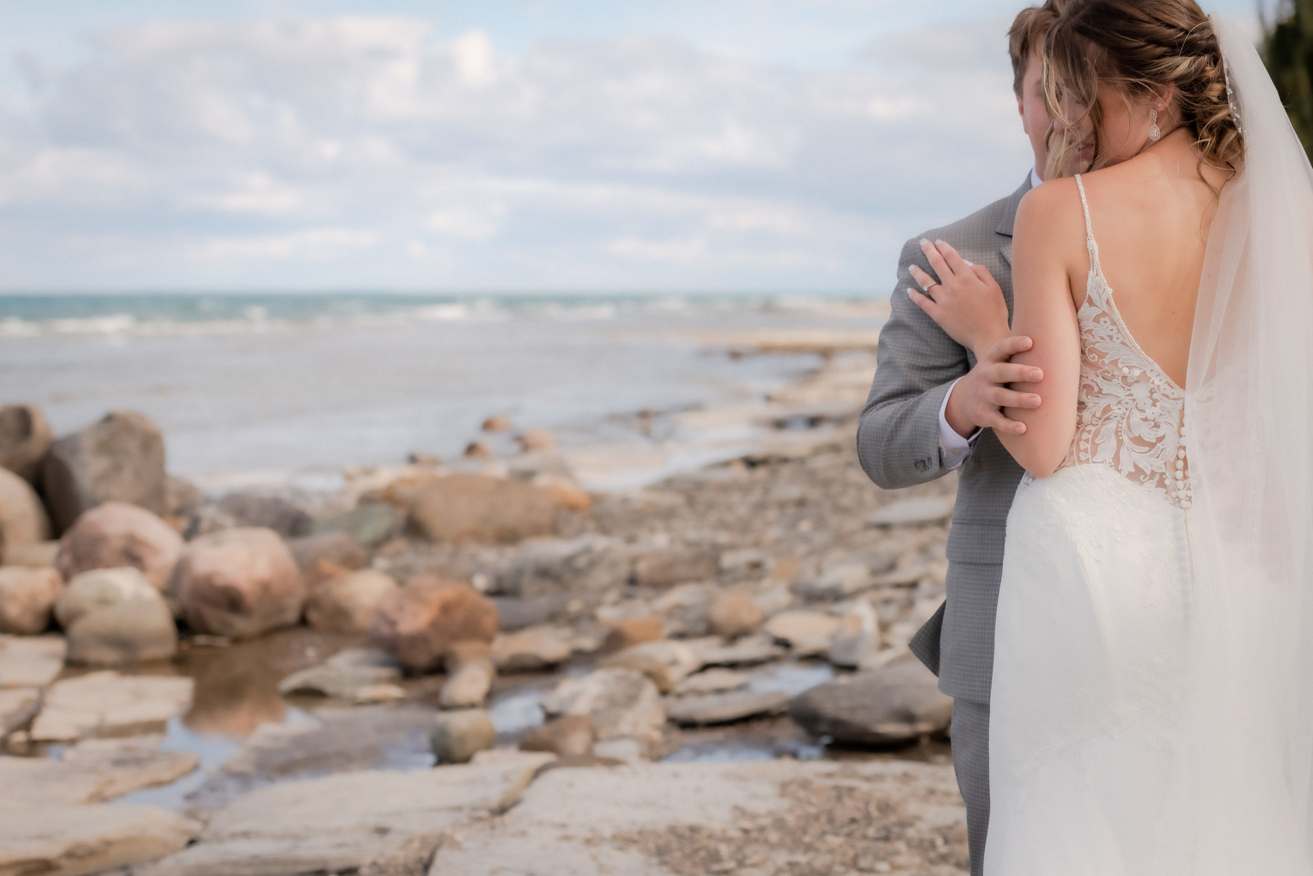 bride groom on shale beach