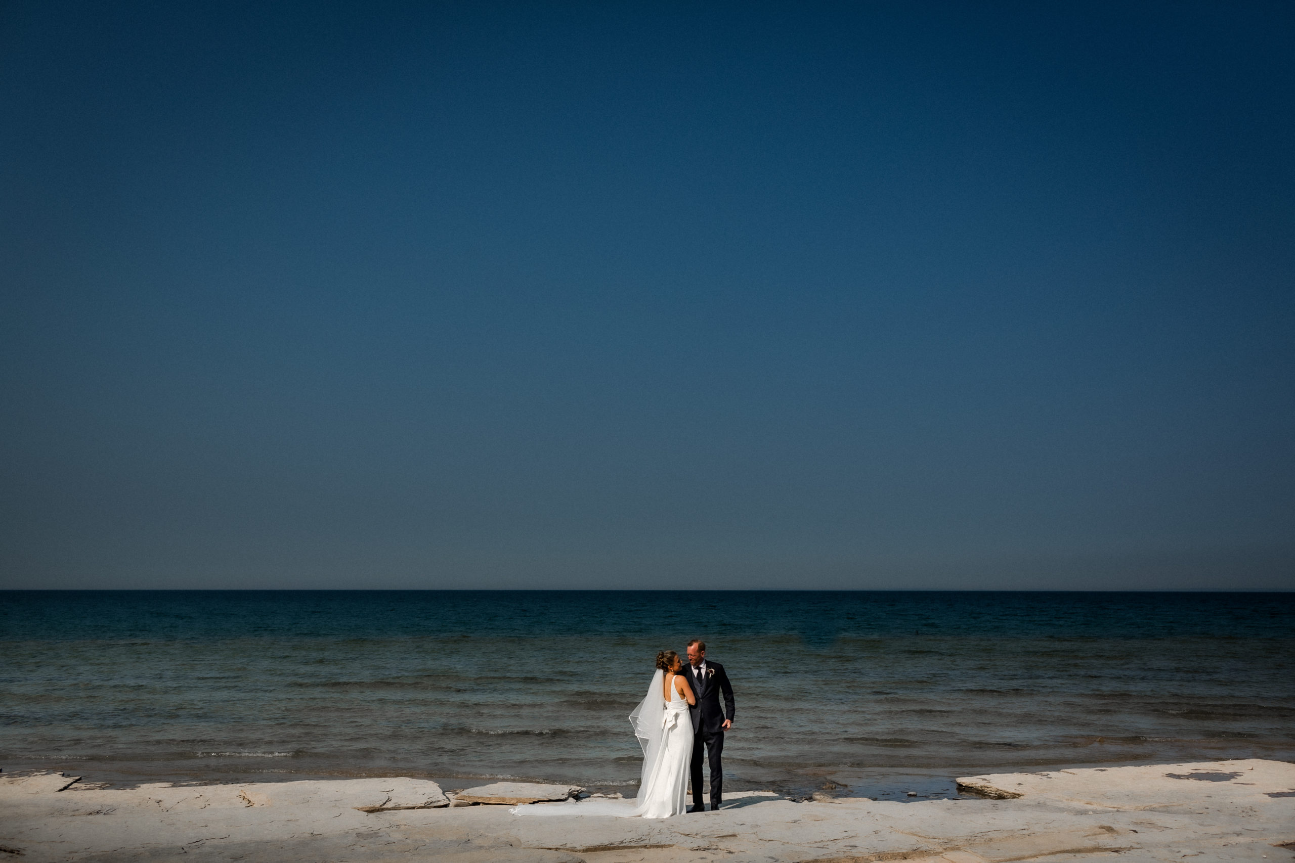 bride groom portrait on Georgian Bay beach