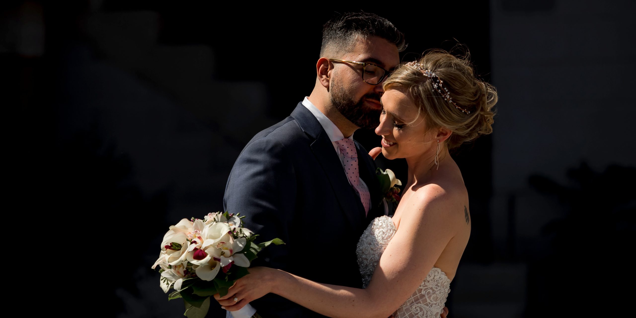 Harsh light wedding photos with bride and groom
