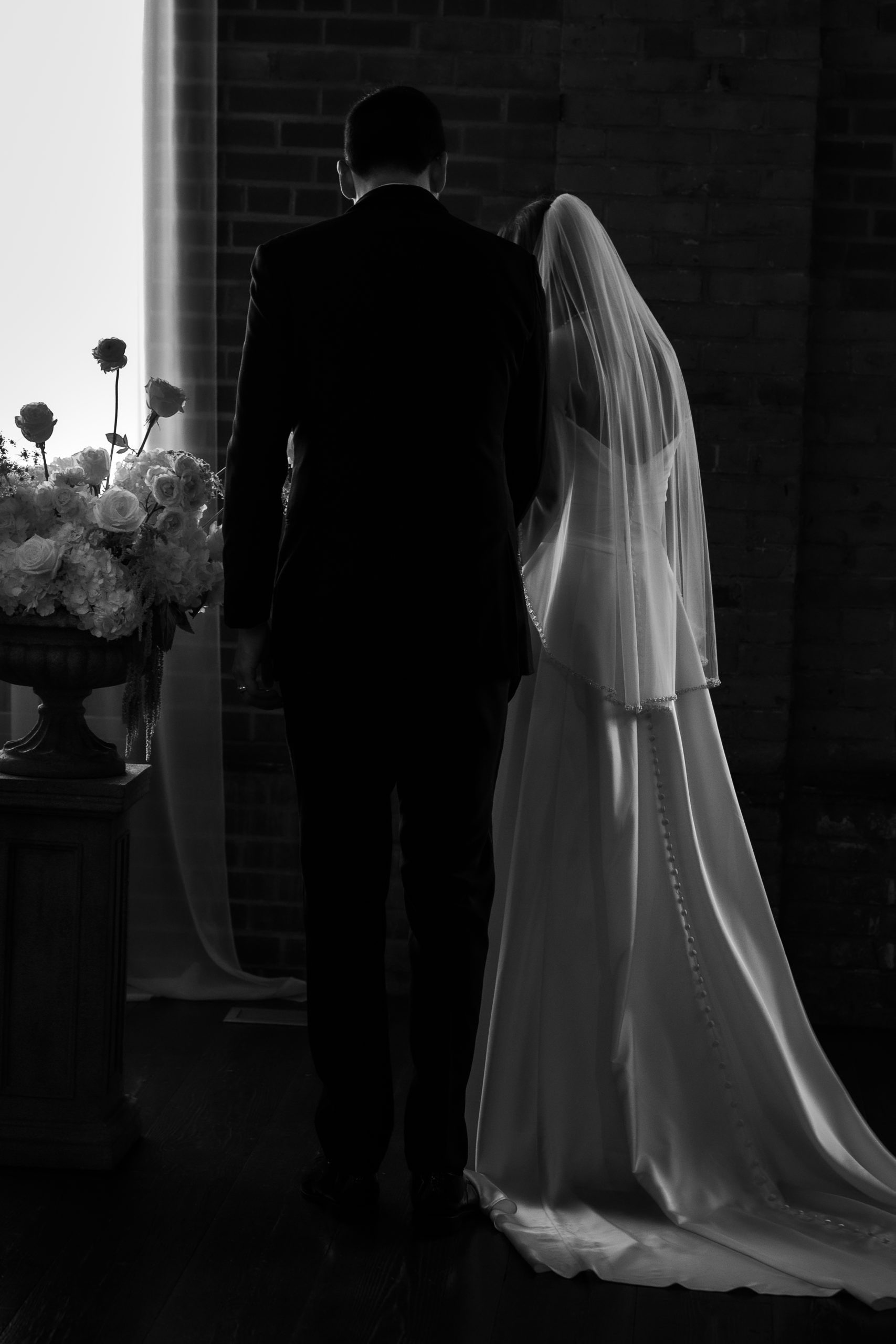 bride groom in window light