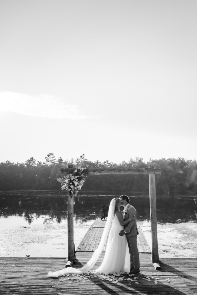 bride groom portrait during golden hour on dock