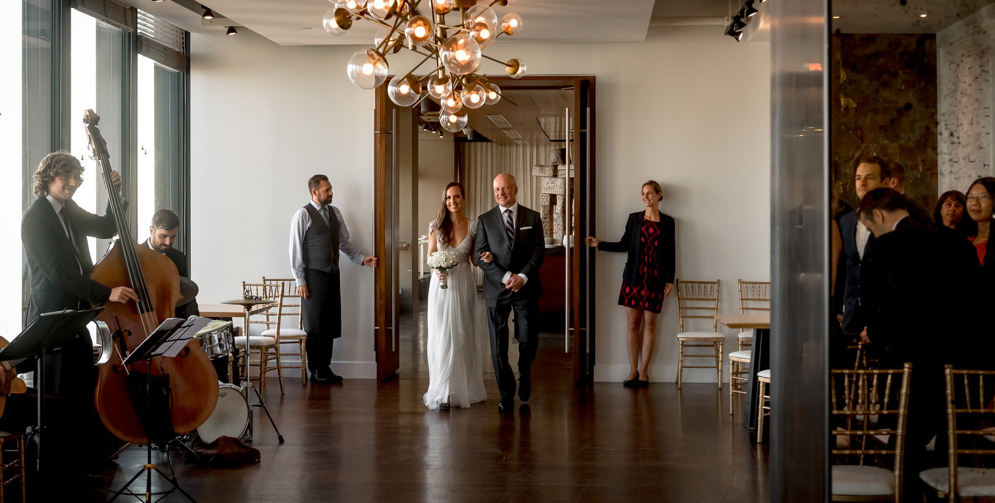 bride and father walking down the aisle