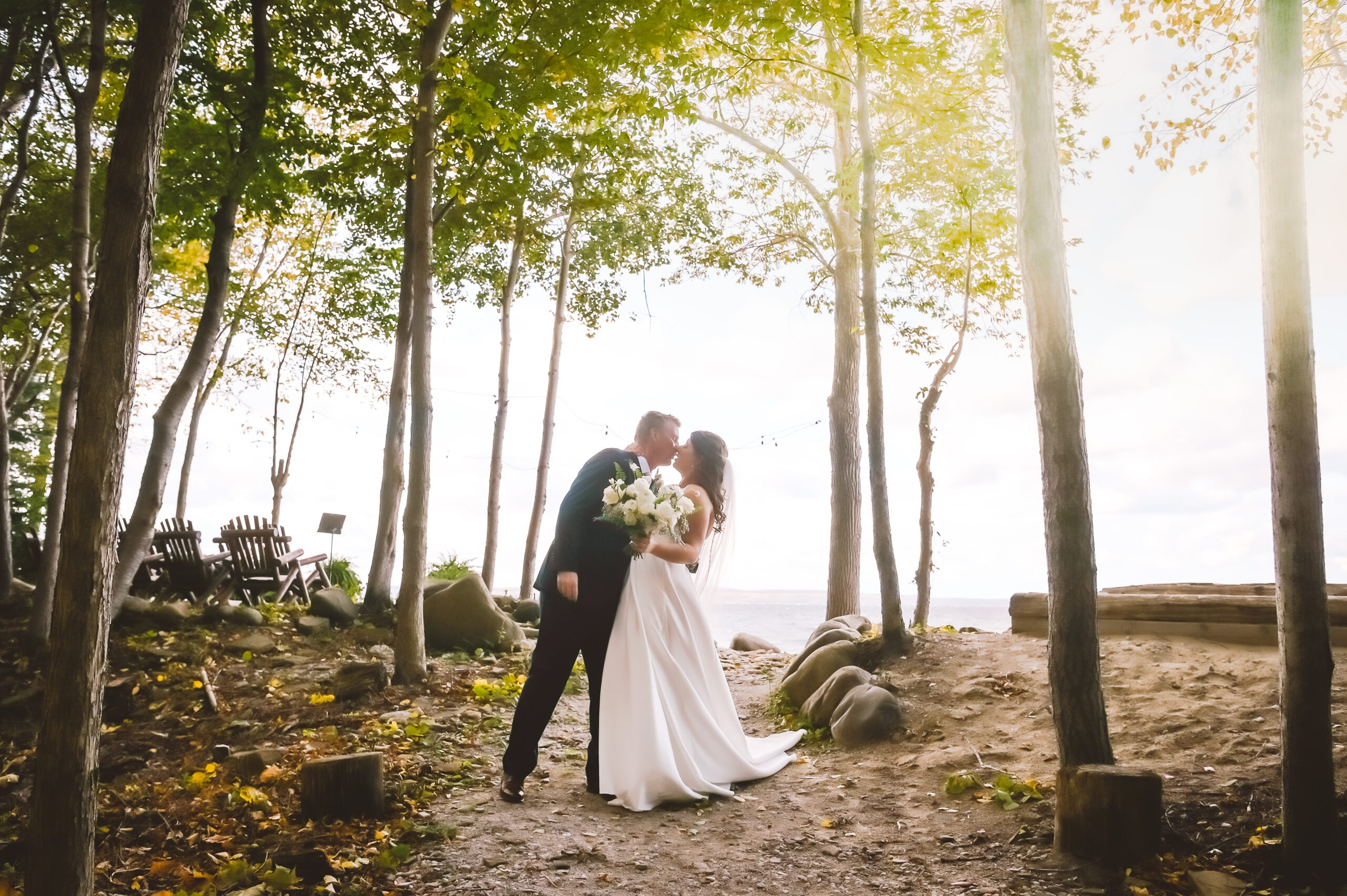 bride groom kiss during ceremony exit at serenity cottage wedding