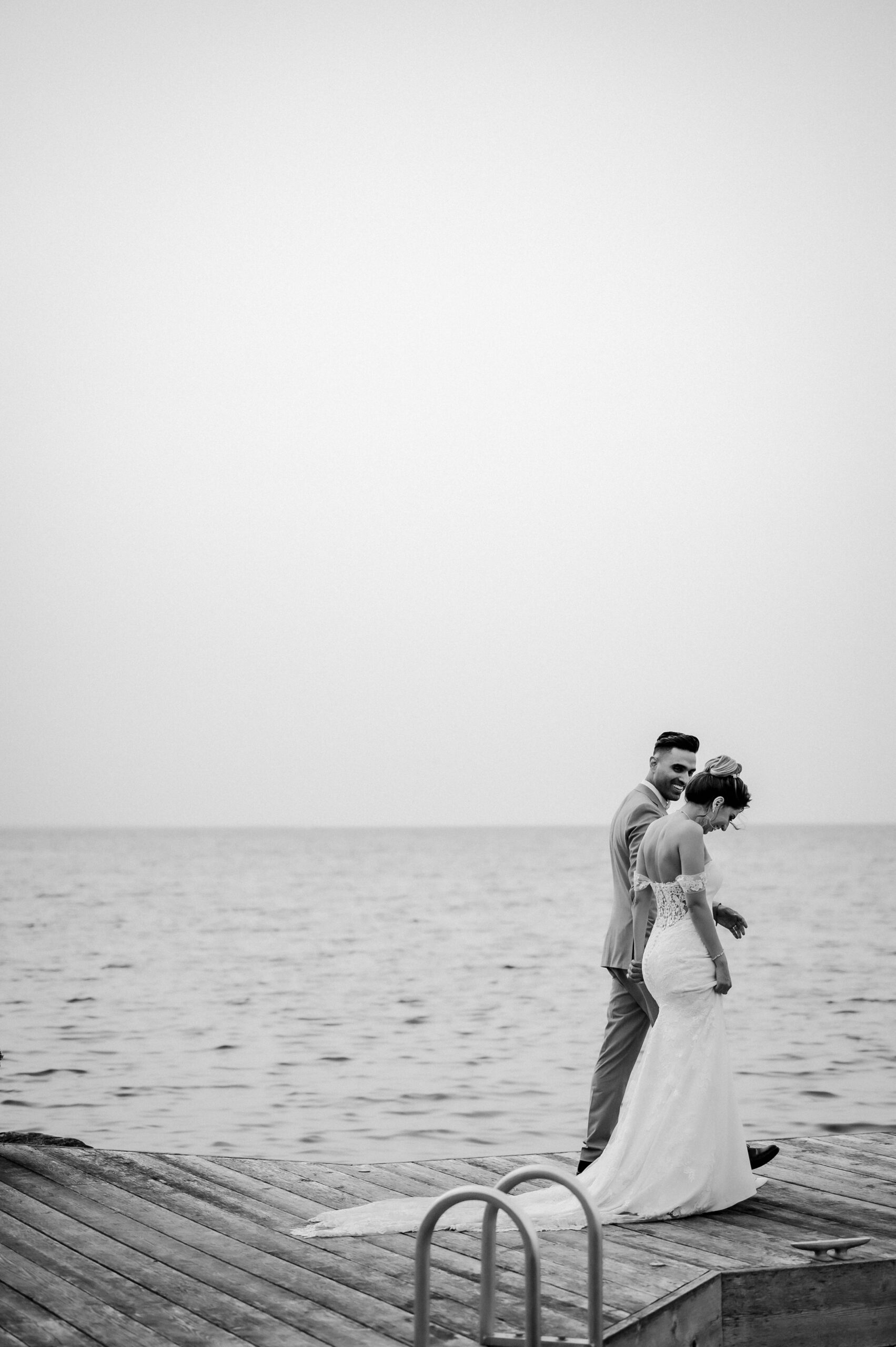 bride groom walking on dock